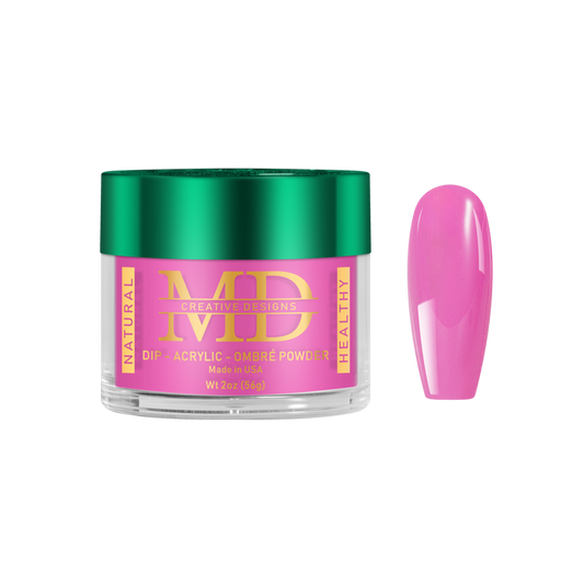 Jar of pink nail powder with a green lid on a white background
