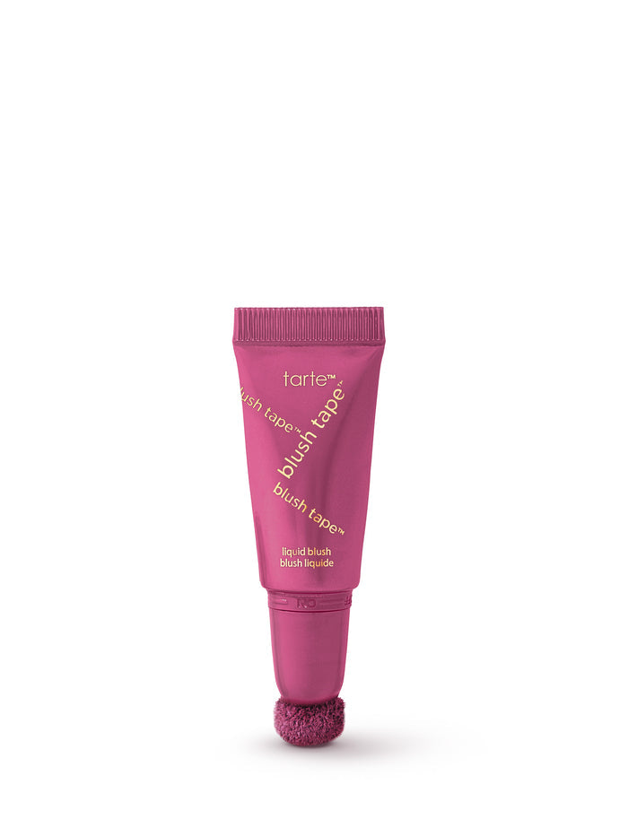 Pink tube of tarte blush tape on a white background