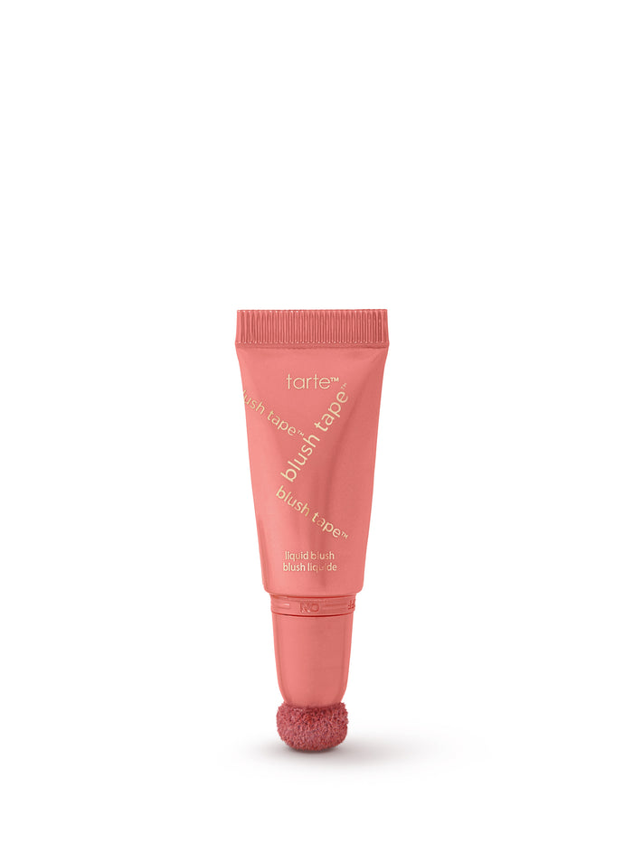 Pink lip balm tube with visible brand name on a white background