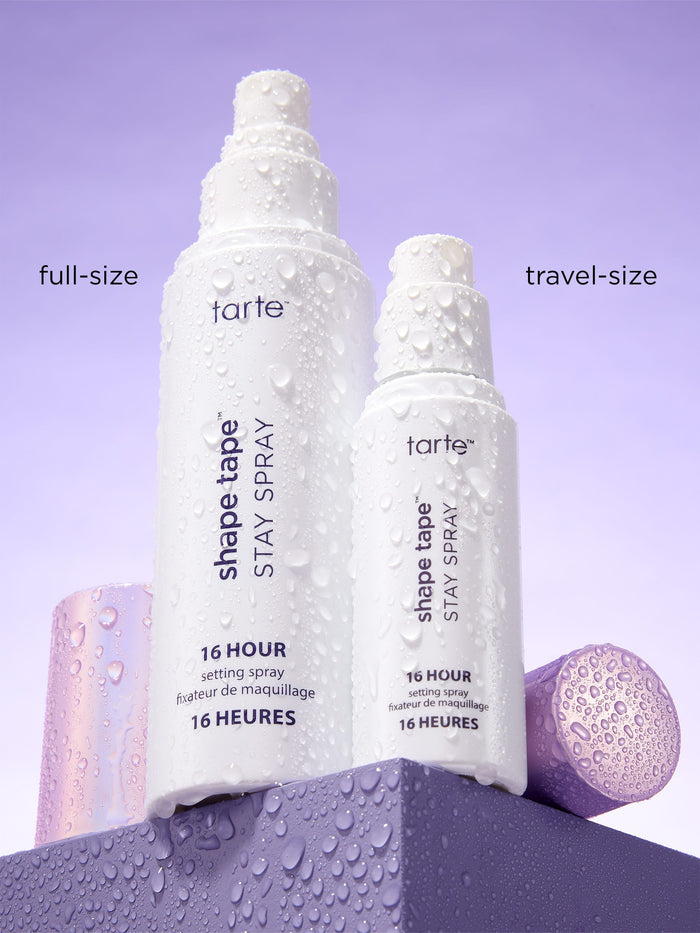 Tarte Shape Tape Stay Spray bottles in full-size and travel-size on a purple background