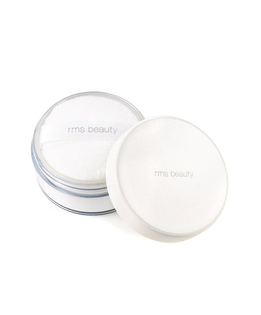 Open container of white RMS Beauty UnPowder with soft puff applicator inside, loose setting powder for natural makeup finish in recyclable packaging.