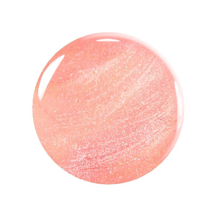 A round swatch of shimmery light pink polish from the Manucurist You  Me at a Tea Party Green Flash™ Set, featuring subtle glitter and a glossy finish, displayed on a white background.