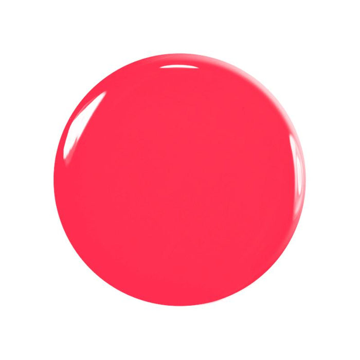 A glossy, round splash of pink from the Manucurist You  Me at a Tea Party Green Flash™ Set, with white highlights on its smooth surface, stands out against a plain white background.